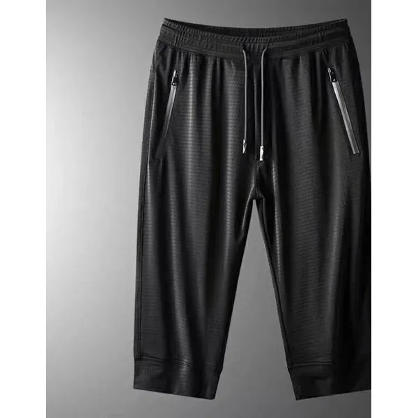 LS-B0675 Blank Cropped Performance Track Pants in Cropped Black – Cuffed Hem, original product photograph