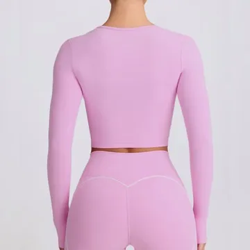 LS-B1050 Women's Long-Sleeve Yoga Top in Sakura Pink, original product photograph